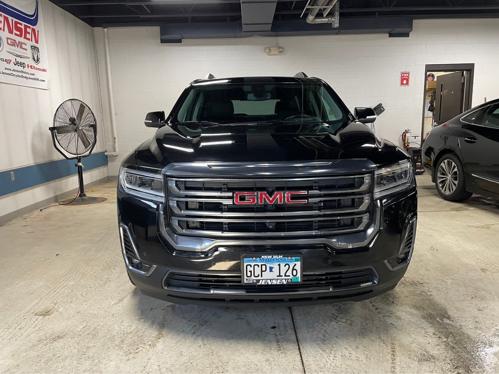 Certified 2021 GMC Acadia AT4 with VIN 1GKKNLLS7MZ186599 for sale in New Ulm, Minnesota